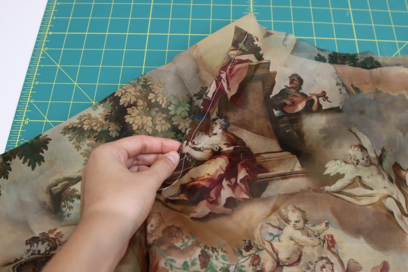 How To Pin Sew French Underarm Seam - Silk Organza - Mood Fabrics - Firenze Blouse Trousers Free Sewing Pattern Tutorial - MDF464 - Mood Fabrics Sewciety Blog - Sew the raw seam allowance into a French seam around the curved underarm seam.