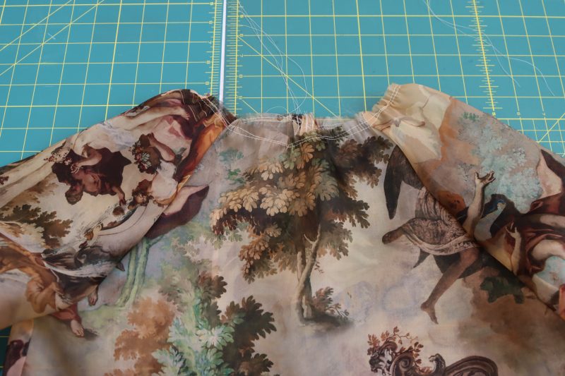 How To Gather Neckline - Silk Organza - Mood Fabrics - Firenze Blouse Trousers Free Sewing Pattern Tutorial - MDF464 - Mood Fabrics Sewciety Blog - Gather the neckline of the blouse to be ¾ the original length of the neckline.