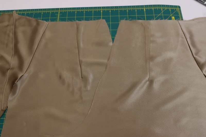 How To Iron Darts - Satin - Mood Fabrics - Firenze Blouse Trousers Free Sewing Pattern Tutorial - MDF464 - Mood Fabrics Sewciety Blog - Iron the back darts towards the back crotch seam.