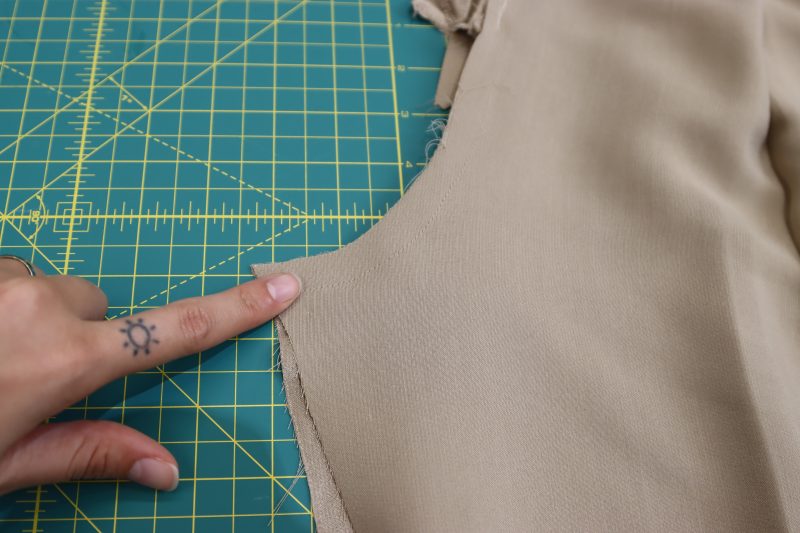 How To Pin Sew Front Crotch - Satin - Mood Fabrics - Firenze Blouse Trousers Free Sewing Pattern Tutorial - MDF464 - Mood Fabrics Sewciety Blog - Pin and sew the front crotch seam up the the bottom of the zipper fly.