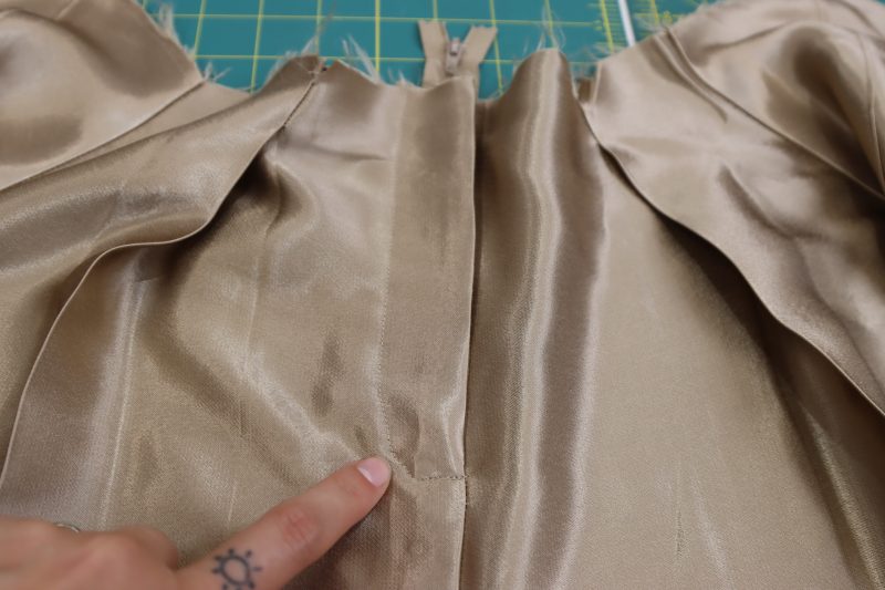 How To Topstitch Fly Facing - Satin - Mood Fabrics - Firenze Blouse Trousers Free Sewing Pattern Tutorial - MDF464 - Mood Fabrics Sewciety Blog - Top stitch the fly facing to the front of the pants.