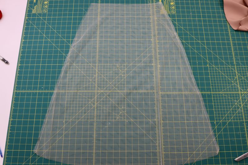 How To Pin Sew Tulle Side Seams - Soft Nylon Tulle - Mood Fabrics - Nolita Vest and Skirt Set Free Sewing Pattern Tutorial - MDF466 MDF467 - Mood Fabrics Sewciety Blog - Pin and sew the side seams of the tulle skirt lining.