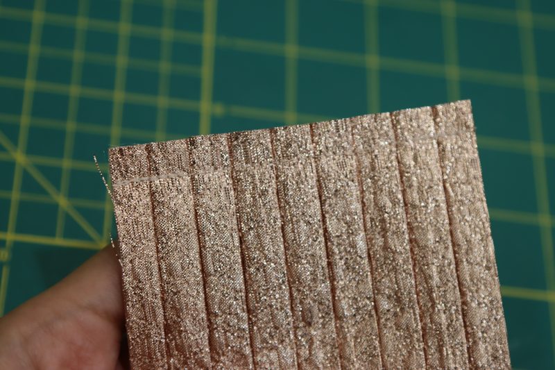 How To Sew Along Pleated Edge - Pleated Luxury Burnout Brocade - Mood Fabrics - Nolita Vest and Skirt Set Free Sewing Pattern Tutorial - MDF466 MDF467 - Mood Fabrics Sewciety Blog - Sew a straight stitch along one of the pleated edges of each ruffle.