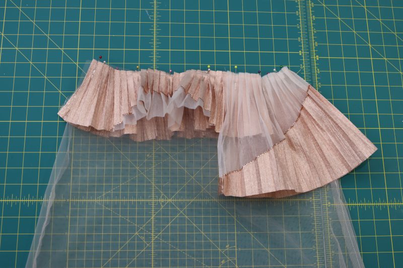 How To Pin Sew First Second Ruffle - Pleated Luxury Burnout Brocade - Mood Fabrics - Nolita Vest and Skirt Set Free Sewing Pattern Tutorial - MDF466 MDF467 - Mood Fabrics Sewciety Blog - Pin and sew ruffles 1 and 2 to the waistband of the tulle.
