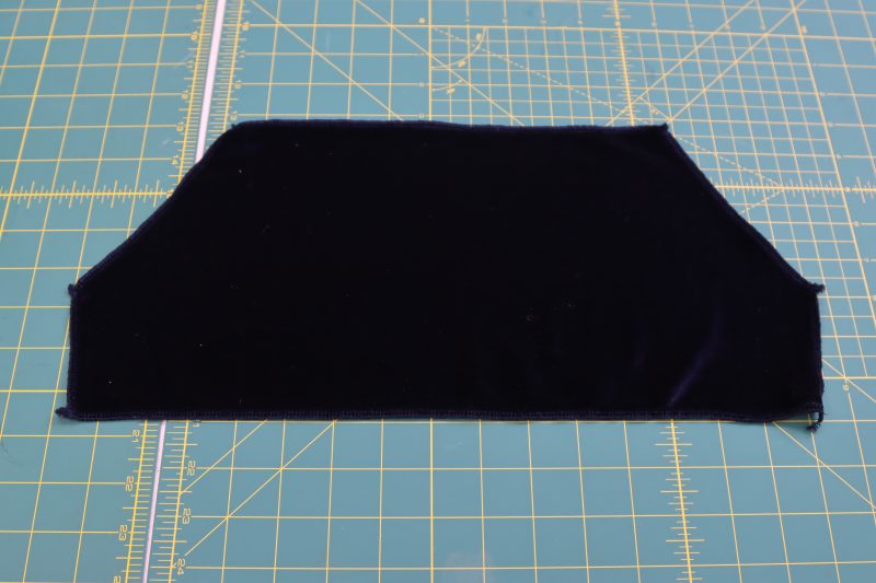How To Serge Pocket Pouch - Maxi Lock Serger Thread - Mood Fabrics - Tarrytown Tracksuit Free Sewing Pattern Tutorial - MDF471 - Mood Fabrics Sewciety Blog - Serge the raw edges of the pocket pouch.
