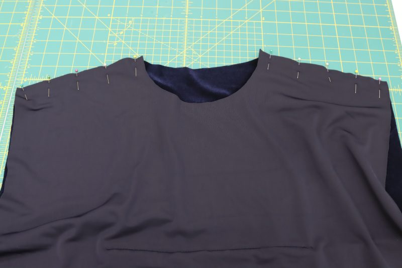 How To Pin Sew Shoulder Seams - Stretch Velour - Mood Fabrics - Tarrytown Tracksuit Free Sewing Pattern Tutorial - MDF471 - Mood Fabrics Sewciety Blog - Pin and sew the shoulder seams together, right sides together.
