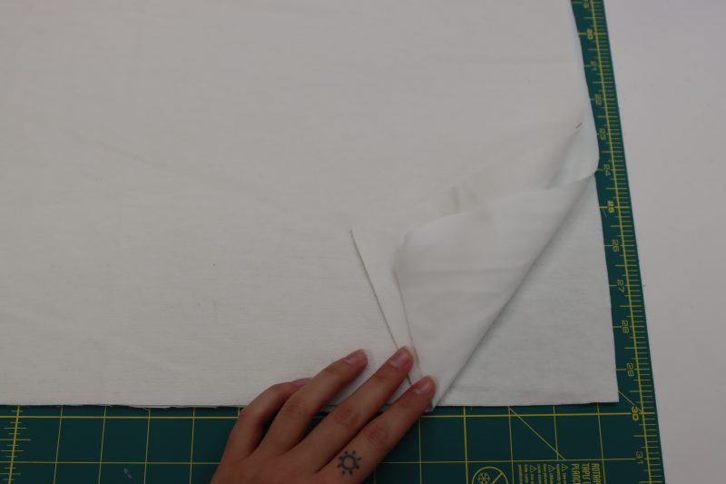How To Layer Batting - Brushed Cotton Duvetyne - Mood Fabrics - Coeur D'Alene Coat Free Sewing Pattern Tutorial - MDF472 - Mood Fabrics Sewciety Blog - Layer the batting (or voile) in between the main fabric and lining pieces so that the outer pieces have their right sides facing out.