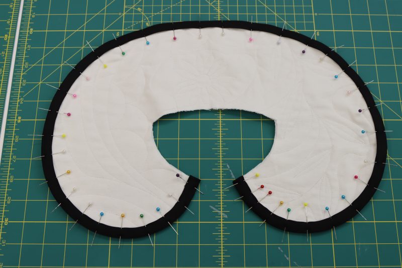 How To Pin Sew Bias Binding To Collar - Mercerized Organic Egyptian Cotton Voile - Mood Fabrics - Coeur D'Alene Coat Free Sewing Pattern Tutorial - MDF472 - Mood Fabrics Sewciety Blog - Pin and sew bias binding to the outer edge of the collar.