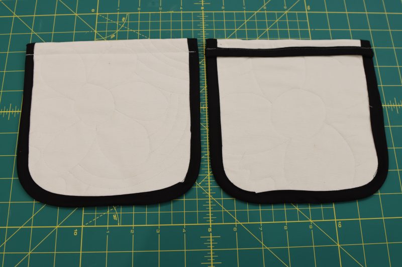 How To Fold Pocket Opening Hem - Brushed Cotton Duvetyne - Mood Fabrics - Coeur D'Alene Coat Free Sewing Pattern Tutorial - MDF472 - Mood Fabrics Sewciety Blog - Fold the top edge of the pocket towards the lining and stitch it into place.