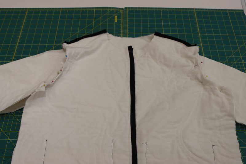 How To Pin Sew Sleeves - Brushed Cotton Duvetyne - Mood Fabrics - Coeur D'Alene Coat Free Sewing Pattern Tutorial - MDF472 - Mood Fabrics Sewciety Blog - Pin and sew the sleeve caps to the armcyes.