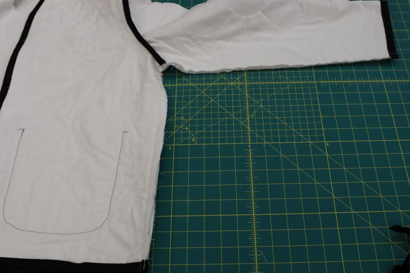 How To Sew Sleeve Side Seams - Brushed Cotton Duvetyne - Mood Fabrics - Coeur D'Alene Coat Free Sewing Pattern Tutorial - MDF472 - Mood Fabrics Sewciety Blog - Sew the sleeve and side seams together.