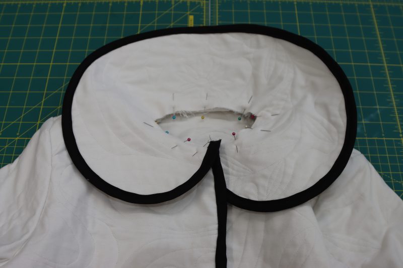 How To Pin Sew Collar To Neckline - Brushed Cotton Duvetyne - Mood Fabrics - Coeur D'Alene Coat Free Sewing Pattern Tutorial - MDF472 - Mood Fabrics Sewciety Blog - Pin the wrong side of the collar to the right side of the coat.