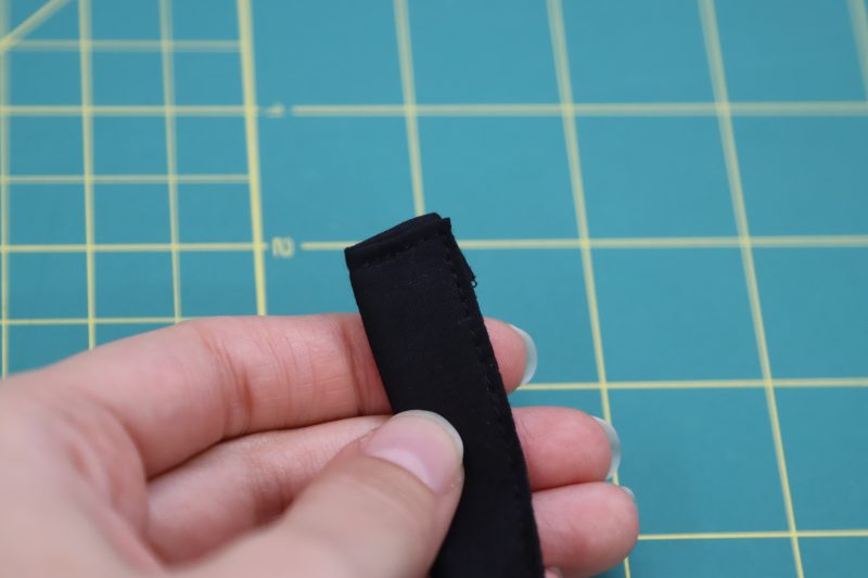 How To Topstitch Ties - Mercerized Organic Egyptian Cotton Voile - Mood Fabrics - Coeur D'Alene Coat Free Sewing Pattern Tutorial - MDF472 - Mood Fabrics Sewciety Blog - Topstitch the open ends of the ties.