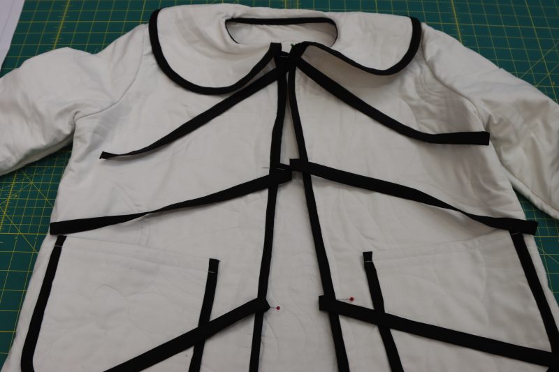 How To Pin Sew Ties To Front Opening - Mercerized Organic Egyptian Cotton Voile - Mood Fabrics - Coeur D'Alene Coat Free Sewing Pattern Tutorial - MDF472 - Mood Fabrics Sewciety Blog - Pin and sew the ties on both sides of the front opening.