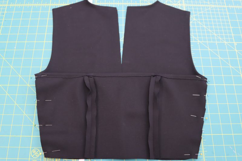 How To Pin Sew Side Seams - Stretch Ponte Knit - Mood Fabrics - Ketchum Jumpsuit Free Sewing Pattern Tutorial - MDF473 - Mood Fabrics Sewciety Blog - Pin and sew the side seams of the front and back top pieces together.