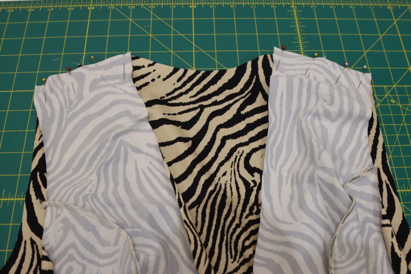 How To Pin Front Back Shoulder Seams - Interlock Knit - Mood Fabrics - Soho Maxi Slip Dress Free Sewing Pattern Tutorial - MDF474 - Mood Fabrics Sewciety Blog - Pin the front and back dress pieces together at the shoulder seams.
