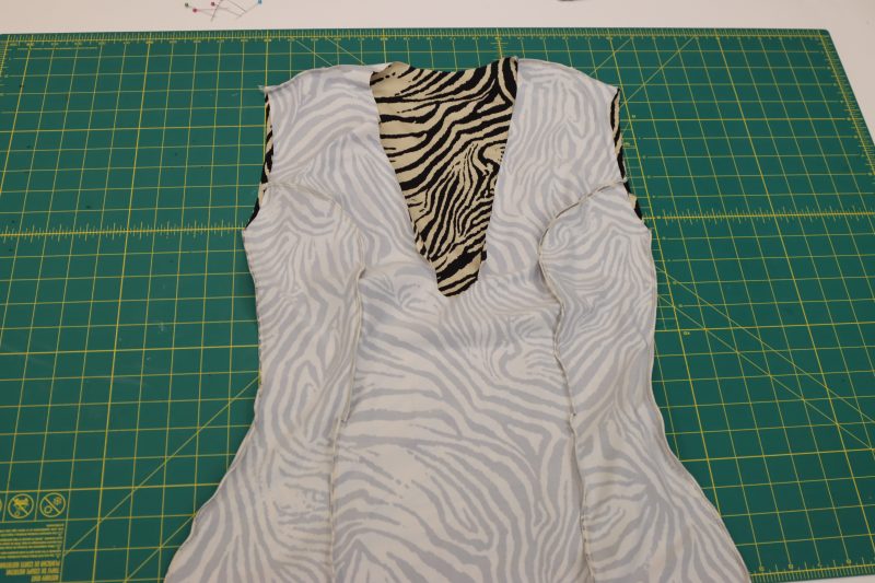 How To Serge Side Seams Main Fabric - Interlock Knit - Mood Fabrics - Soho Maxi Slip Dress Free Sewing Pattern Tutorial - MDF474 - Mood Fabrics Sewciety Blog - Serge the side seams of the dress together.