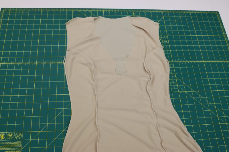 How To Serge Side Seams Lining Fabric - Crepe Knit - Mood Fabrics - Soho Maxi Slip Dress Free Sewing Pattern Tutorial - MDF474 - Mood Fabrics Sewciety Blog - Repeat all the previous steps so that the lining piece matches the main fabric, except with the slit on the opposite side of the dress.