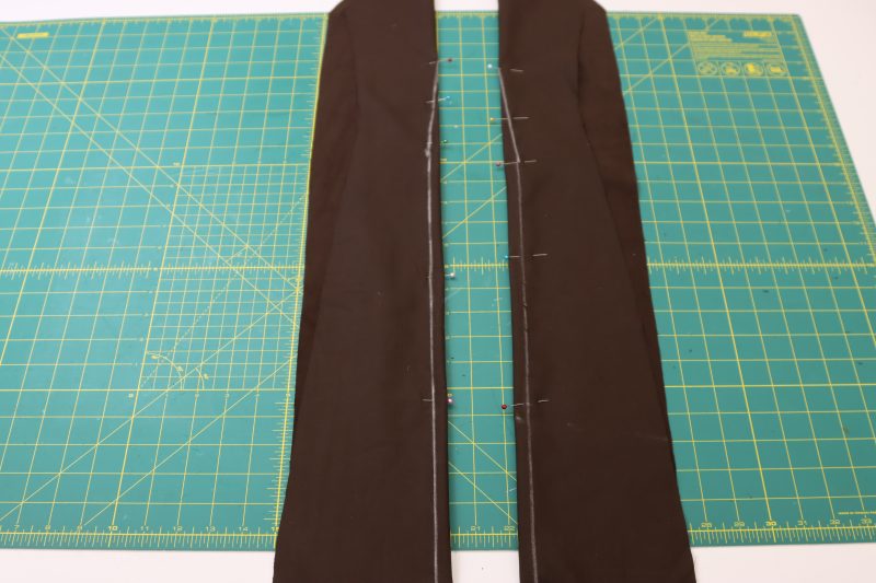 How To Fold Front Darts - Featherwale Cotton Corduroy - Mood Fabrics - Fawn Mini Dress Free Sewing Pattern Tutorial - MDF476 - Mood Fabrics Sewciety Blog - Fold the front center pieces right sides together over the darts.
