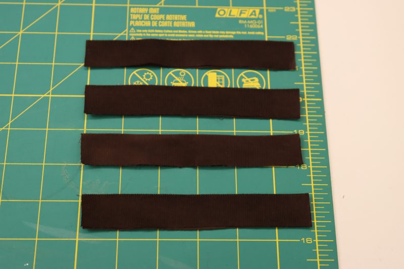 How To Iron Pocket Welts - Featherwale Cotton Corduroy - Mood Fabrics - Fawn Mini Dress Free Sewing Pattern Tutorial - MDF476 - Mood Fabrics Sewciety Blog - Iron the pocket welts in half lengthwise, wrong sides together.
