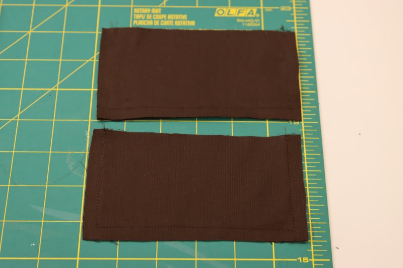 How To Sew Three Sides Of Pocket Flaps - Featherwale Cotton Corduroy - Mood Fabrics - Fawn Mini Dress Free Sewing Pattern Tutorial - MDF476 - Mood Fabrics Sewciety Blog - Sew around 3 sides of the pocket flaps.