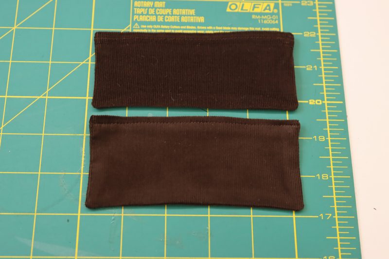 How To Flip Pocket Flaps Right Sides Out - Featherwale Cotton Corduroy - Mood Fabrics - Fawn Mini Dress Free Sewing Pattern Tutorial - MDF476 - Mood Fabrics Sewciety Blog - Flip the pocket flaps right sides out.