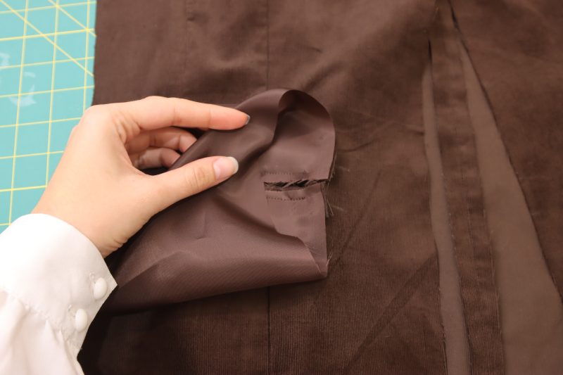 How To Sew Pocket Lining - Bemberg Lining - Mood Fabrics - Fawn Mini Dress Free Sewing Pattern Tutorial - MDF476 - Mood Fabrics Sewciety Blog - Sew the pocket lining directly onto the seams connecting the welts to the dress.