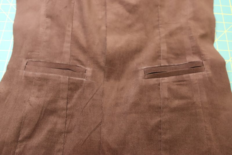 How To Flip Pockets To Wrong Side - Bemberg Lining - Mood Fabrics - Fawn Mini Dress Free Sewing Pattern Tutorial - MDF476 - Mood Fabrics Sewciety Blog - Flip the welts and pocket lining towards the inside of the dress.