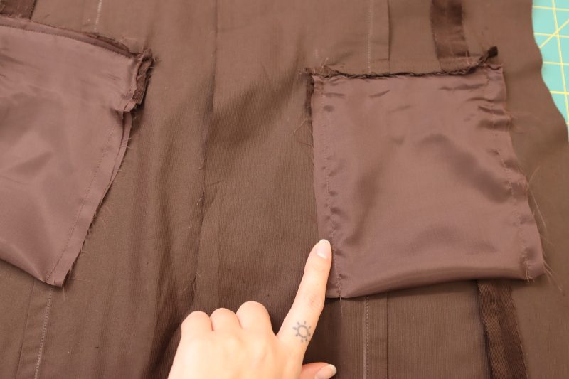 How To Sew Pocket Side Seams - Bemberg Lining - Mood Fabrics - Fawn Mini Dress Free Sewing Pattern Tutorial - MDF476 - Mood Fabrics Sewciety Blog - Sew the sides of the pocket lining shut.