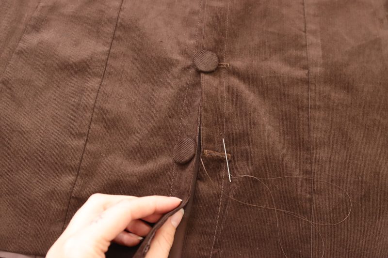 How To Sew Fabric Covered Buttons - Dritz Half Ball Covered Buttons - Mood Fabrics - Fawn Mini Dress Free Sewing Pattern Tutorial - MDF476 - Mood Fabrics Sewciety Blog - Hand sew the fabric covered buttons opposite to the button holes.
