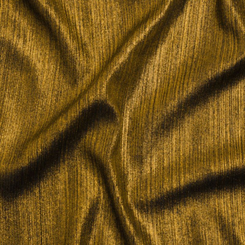 Close-up texture of Textured AllOver Foil Knit Metallic Gold fabric from the Lizabet Collection, used for the Anara Wrap Dress sewing pattern.