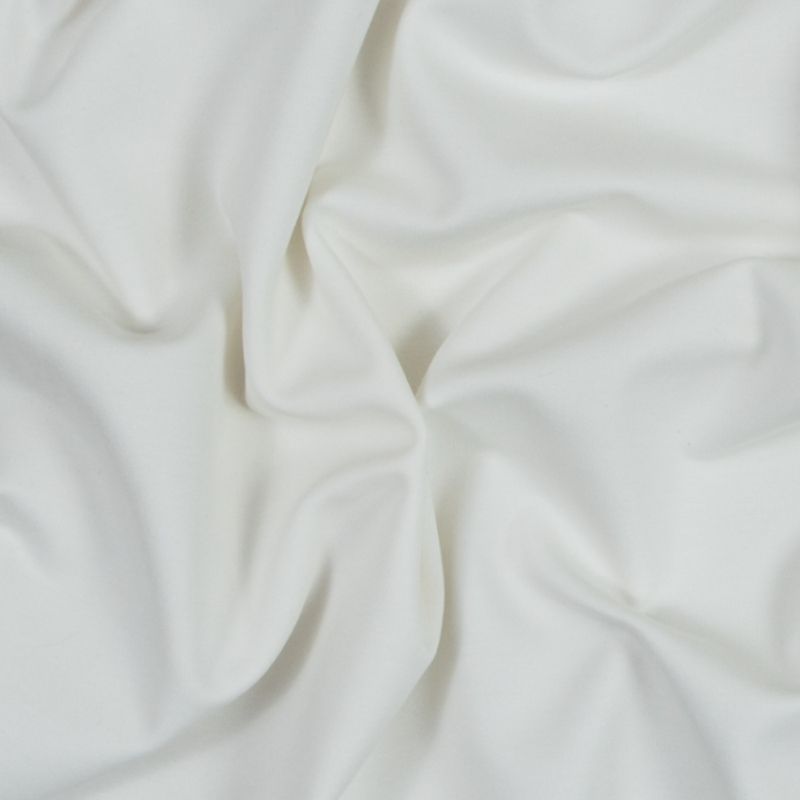 Smooth, draped texture of Stretch Ponte Knit in Whisper White fabric from the Papilio Collection, used for the Pine Dress sewing pattern.