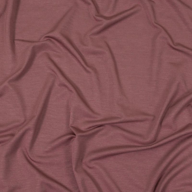 Soft, textured drape of UltraSoft Rayon Jersey in Dark Mauve fabric from the Cyrus Collection, used for the Rhodes Infinity Dress sewing pattern.