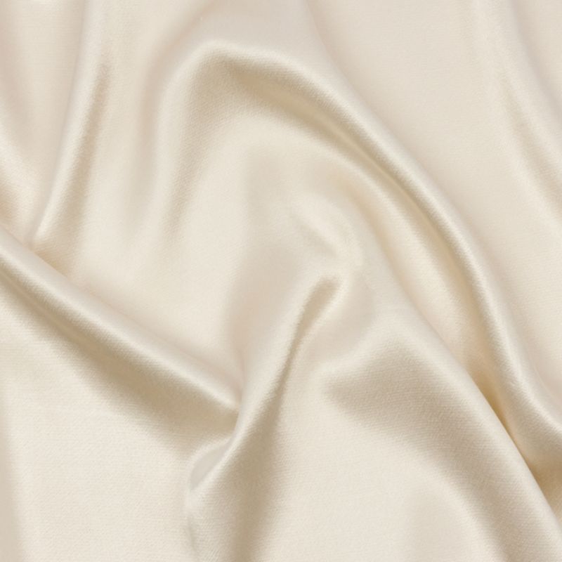 Smooth, flowing texture of Sustainable Viscose Fluid Satin in Light Stone from the Mood Exclusive Elliana Collection, used for the Seraphina Cowl Neck Dress sewing pattern.
