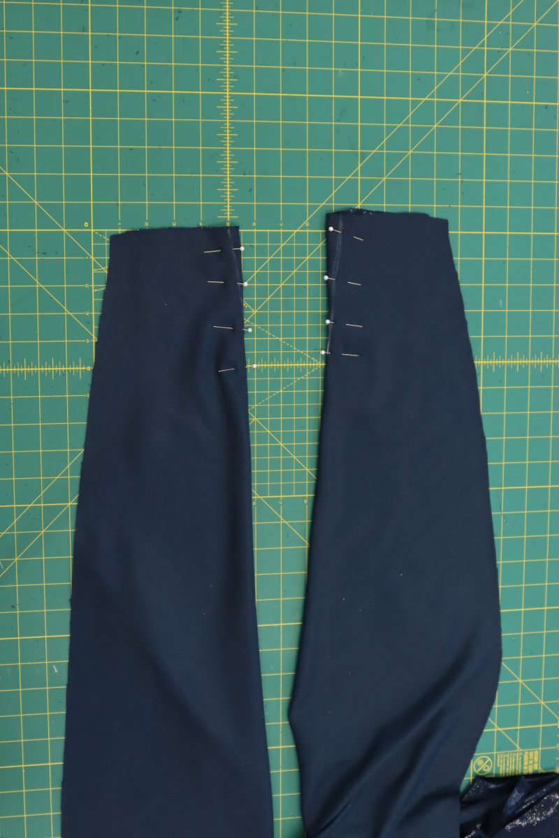 How To Fold Front Darts - Metallic Velvet - Mood Fabrics - Jasper Jumpsuit Free Sewing Pattern Tutorial - MDF486 - Mood Fabrics Sewciety Blog - Fold and pin the front darts into place.