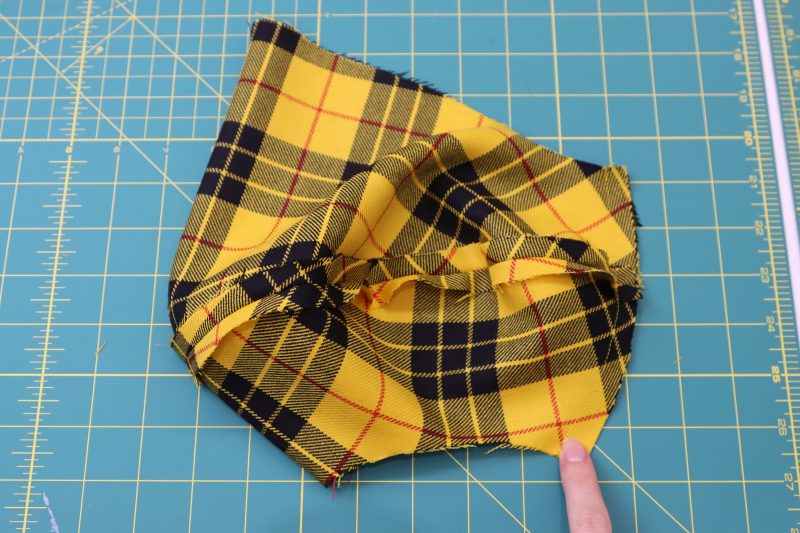 How To Pin Sew Sleeve Side Seams - Virgin Wool Twill - Mood Fabrics - Silverstone Mini Dress Free Sewing Pattern Tutorial - MDF489 - Mood Fabrics Sewciety Blog - Pin and sew the sleeve side seams.