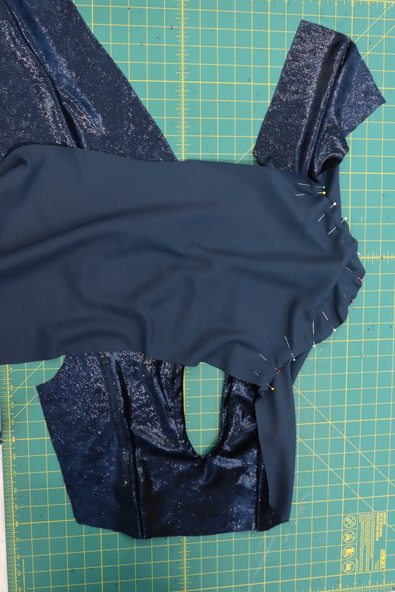 How To Pin Sleeve Caps To Armscyes - Metallic Velvet - Mood Fabrics - Jasper Jumpsuit Free Sewing Pattern Tutorial - MDF486 - Mood Fabrics Sewciety Blog - Pin the sleeve caps to the armscyes, right sides together.