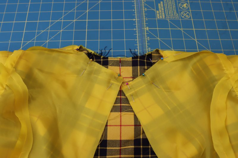 How To Pin Sew Necklines - Virgin Wool Twill - Mood Fabrics - Silverstone Mini Dress Free Sewing Pattern Tutorial - MDF489 - Mood Fabrics Sewciety Blog - Pin and sew the necklines right sides together.