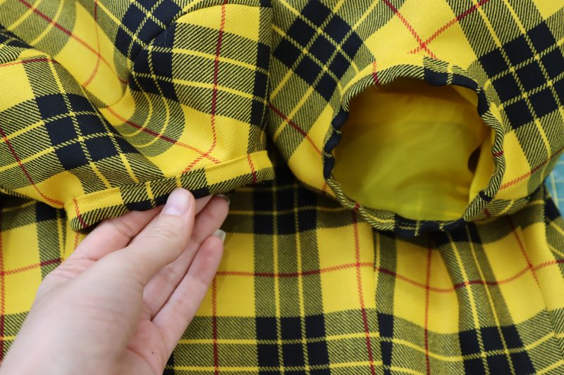 How To Sew Cuffs To Sleeves - Virgin Wool Twill - Mood Fabrics - Silverstone Mini Dress Free Sewing Pattern Tutorial - MDF489 - Mood Fabrics Sewciety Blog - Sew the sleeve cuffs to the sleeve opening.