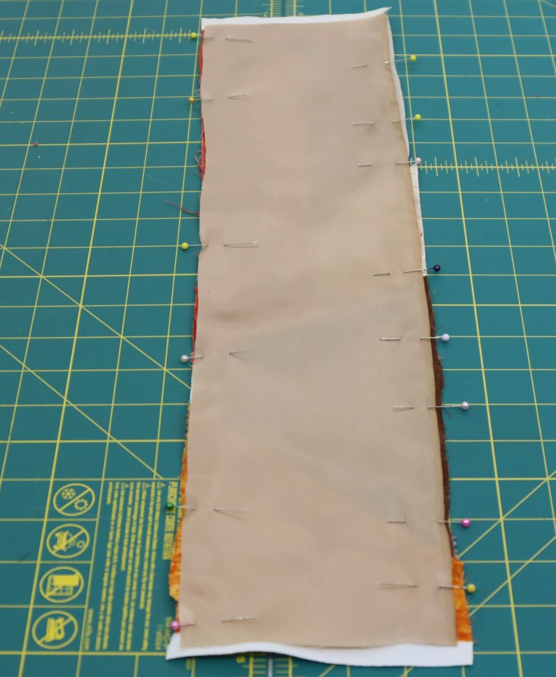 How To Sew Strap Fabric to Lining - Acetate Twill Lining - Mood Fabrics - Pecan Patchwork Bag Free Sewing Pattern Tutorial - MDF482 - Mood Fabrics Sewciety Blog - Strap patchwork and lining pinned right sides together.