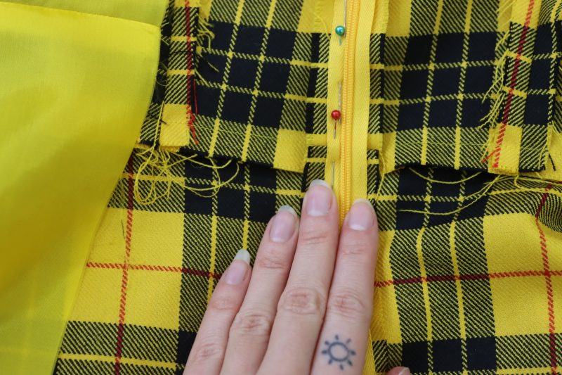 How To Line Up Center Back Patterns - Virgin Wool Twill - Mood Fabrics - Silverstone Mini Dress Free Sewing Pattern Tutorial - MDF489 - Mood Fabrics Sewciety Blog - Line up all the lines from the plaid pattern at the center back seam.