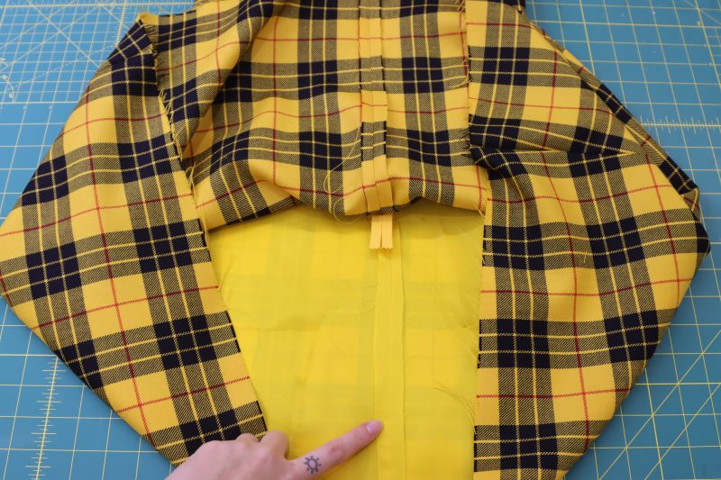 How To Press Center Back Seams - Virgin Wool Twill - Mood Fabrics - Silverstone Mini Dress Free Sewing Pattern Tutorial - MDF489 - Mood Fabrics Sewciety Blog - Press the seams open and flat.