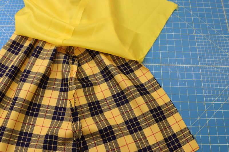 How To Sew Center Back Seams - Virgin Wool Twill - Mood Fabrics - Silverstone Mini Dress Free Sewing Pattern Tutorial - MDF489 - Mood Fabrics Sewciety Blog - Sew the center back seams under the zipper.