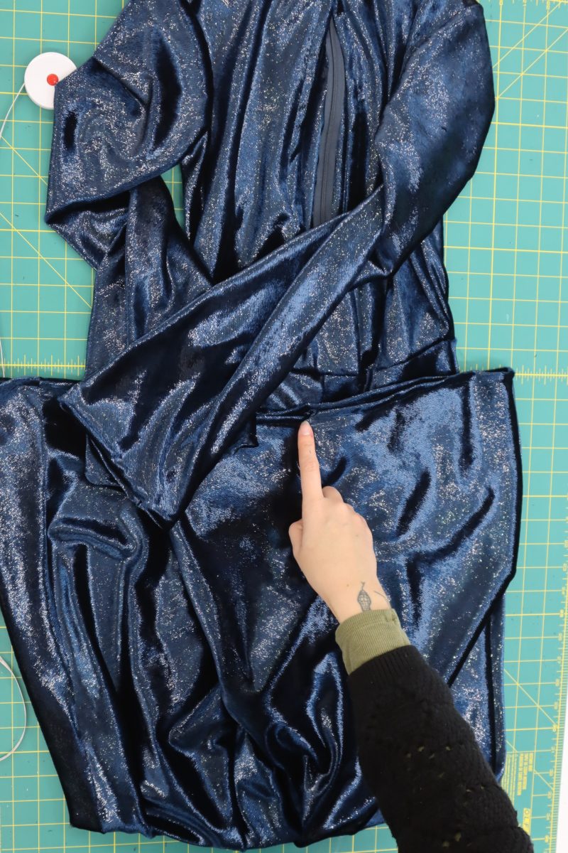 How To Sew Half Inch Hems - Metallic Velvet - Mood Fabrics - Jasper Jumpsuit Free Sewing Pattern Tutorial - MDF486 - Mood Fabrics Sewciety Blog - Sew a ½ inch hem along the edges of the sleeves and pant legs.