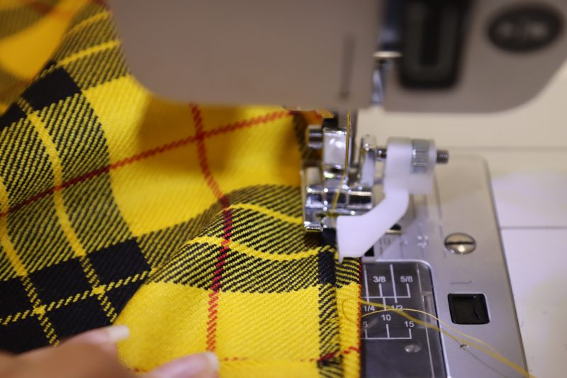 How To Sew Blind Hem - Virgin Wool Twill - Mood Fabrics - Silverstone Mini Dress Free Sewing Pattern Tutorial - MDF489 - Mood Fabrics Sewciety Blog - Sew a blind hem along the bottom of the main fabric skirt.