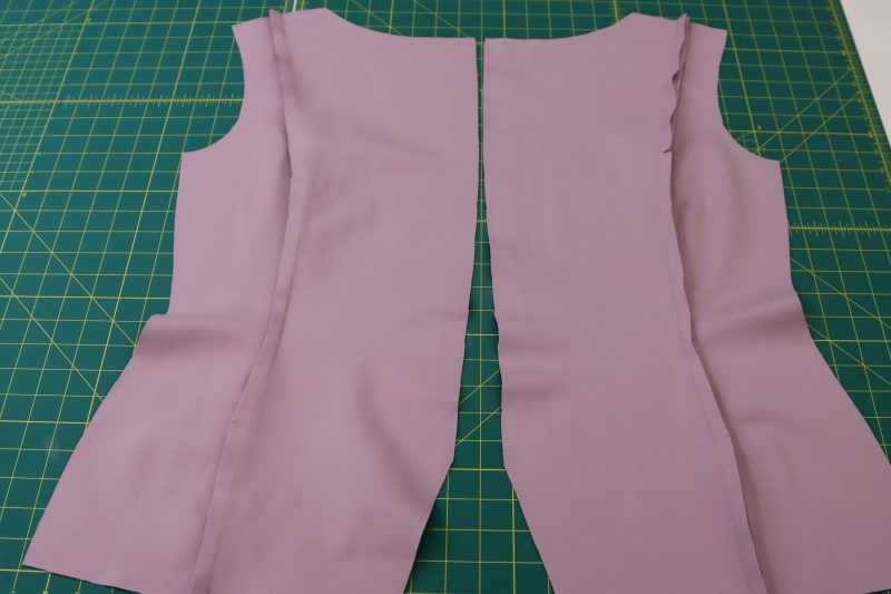 How To Pin Sew Front Cardigan Pieces - Stretch Ponte Knit - Mood Fabrics - Camarillo Cardigan and Magdalene Midi Skirt Free Sewing Pattern Tutorial - MDF490 - Mood Fabrics Sewciety Blog - Pin and sew the front center and front side pieces together.