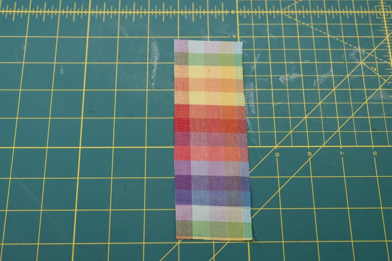 How To Cut Keyhole Facing - Rainbow Checks Cotton Shirting - Mood Fabrics - Bayport Blouse Free Sewing Pattern Tutorial - MDF494 - Mood Fabrics Sewciety Blog - Cut the keyhole facing.