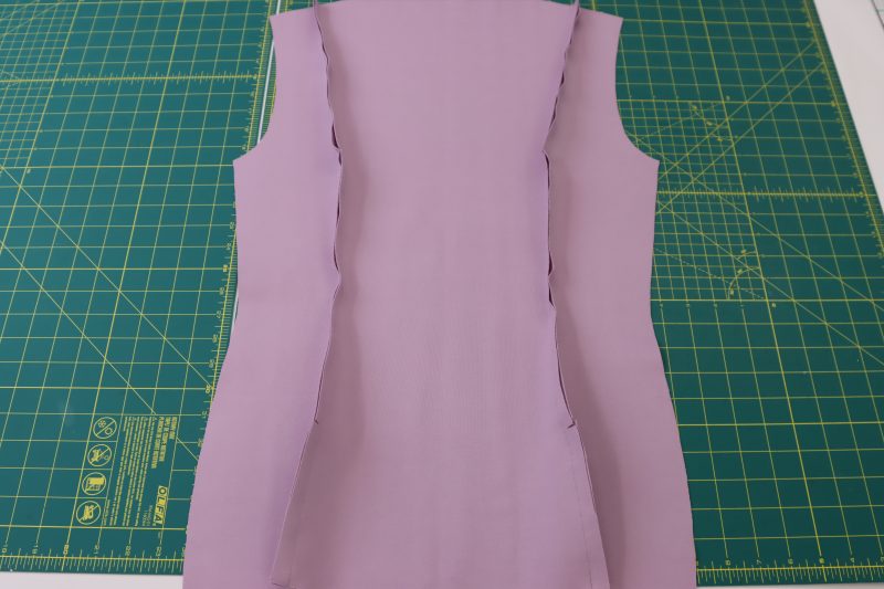 How To Pin Sew Back Cardigan Pieces - Stretch Ponte Knit - Mood Fabrics - Camarillo Cardigan and Magdalene Midi Skirt Free Sewing Pattern Tutorial - MDF490 - Mood Fabrics Sewciety Blog - Pin and sew the back center and back side pieces together.