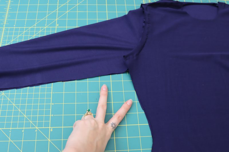 How To Line Up Sleeve Side Seams - Stretch Bamboo Jersey - Mood Fabrics - Altena Blouse Free Sewing Pattern Tutorial - MDF491 - Mood Fabrics Sewciety Blog - Line up the side seams and sleeve inseam.
