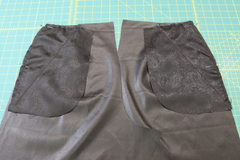 How To Pin Back Side Pockets - Buttery Faux Leather - Mood Fabrics - Dresden Shorts Free Sewing Pattern Tutorial - MDF493 - Mood Fabrics Sewciety Blog - Pin pockets B to the side seams of the back of the shorts.